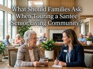 Family touring a Santee senior living community, asking staff questions about assisted living care